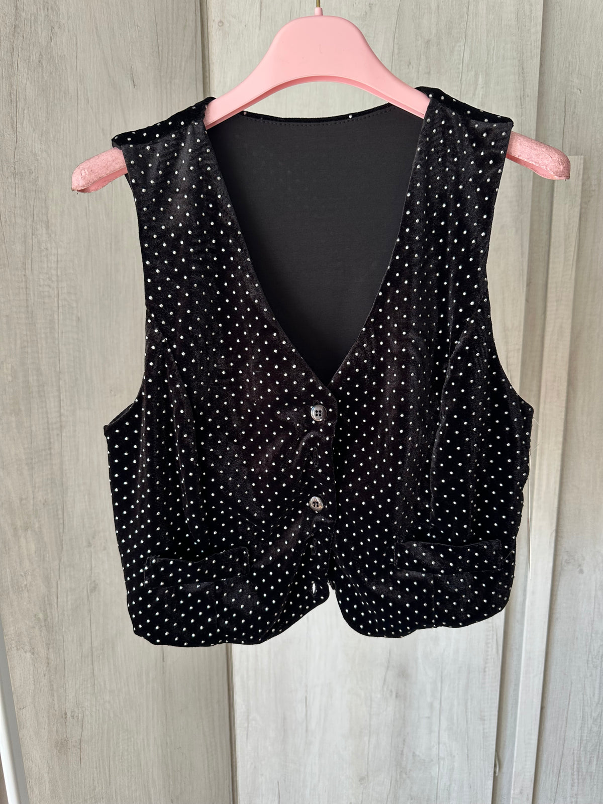 Gilet con borchiette